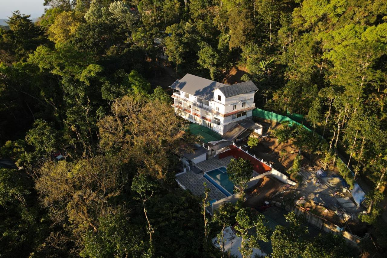 Hotel Tree Blanche à Munnar Extérieur photo